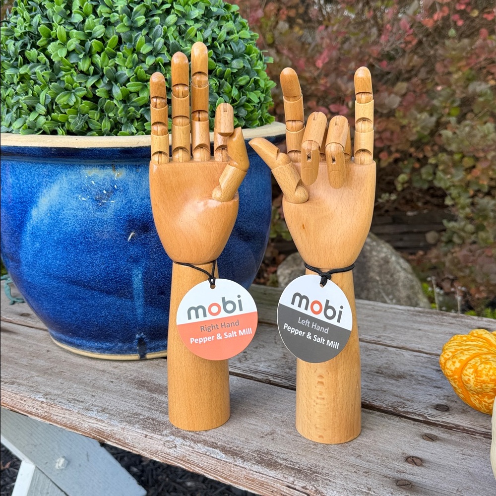 Set of HTF MOBI articulated wood hand salt & pepper grinders, left & right hand.